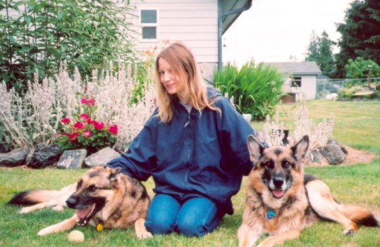 picture of two shepard dogs and owner of Kris' Petsitting